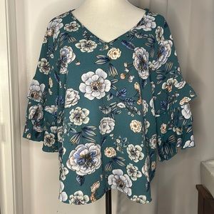 Green floral v-neck blouse with ruffle 3/4 sleeves in size 1X